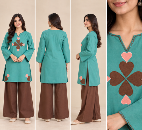 A woman modeling a teal long kurta with brown wide-leg pants, shown in front, back, side, and close-up views against a plain beige studio background. The kurta has a V-neck, long sleeves, and embroidered heart and clover motifs in brown and pink.